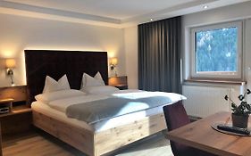 Hotel Garni Central - Zimmer - Studios - Apartments